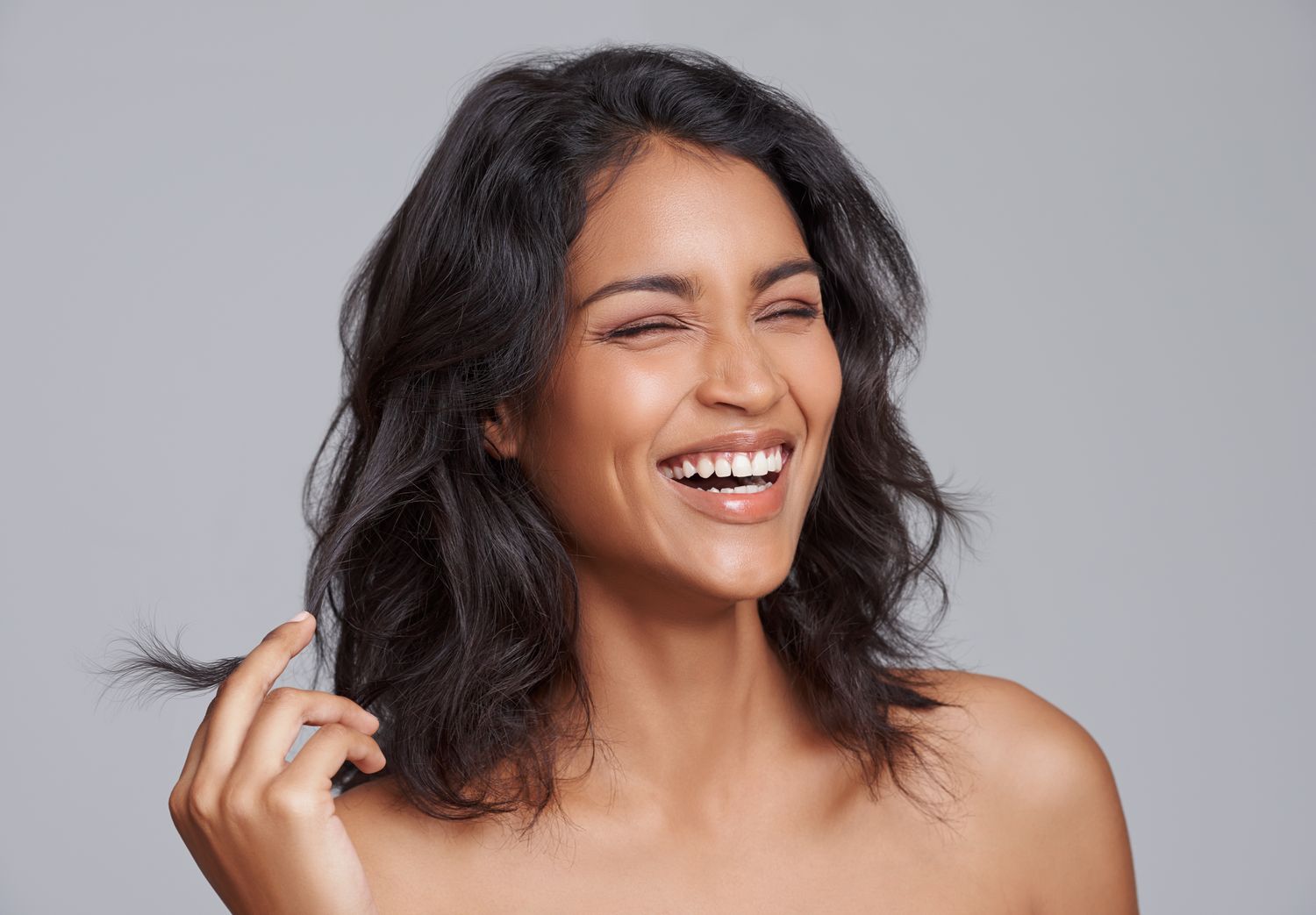 medspa patient model laughing