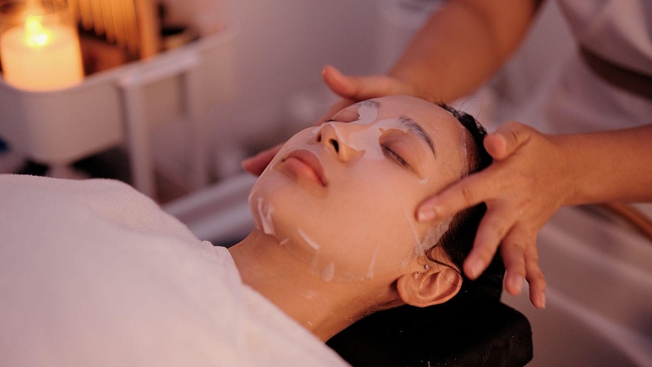 Facial treatment in a serene spa setting.
