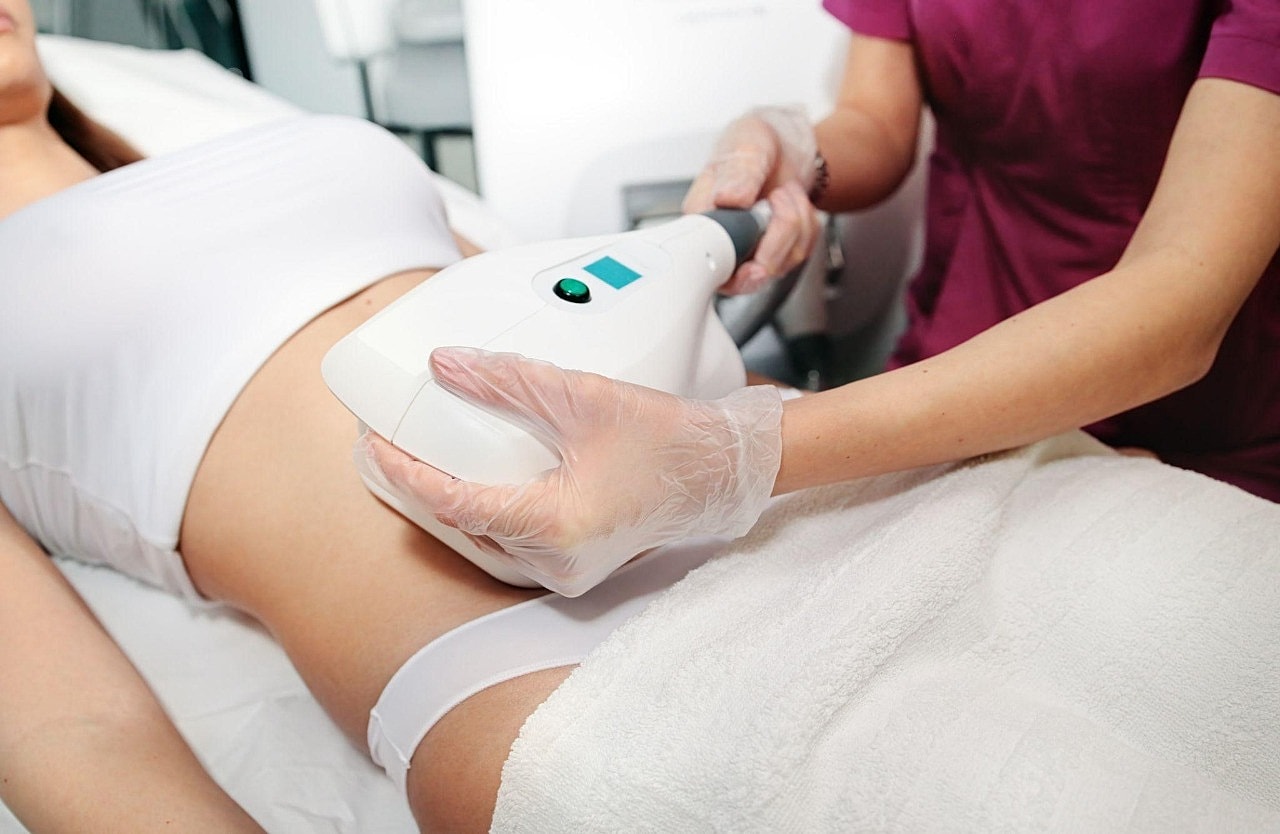 Why We Love MommyFit for Post-Pregnancy Caretreatment session on a patient's abdomen